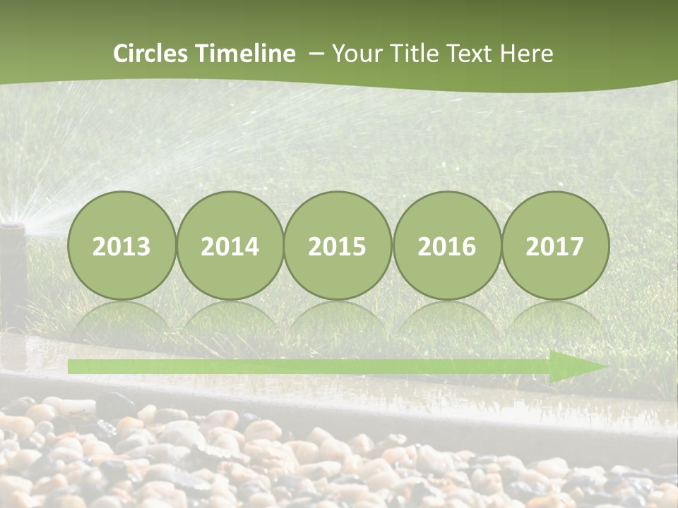 A Sprinkle Is Spraying Water On A Lawn PowerPoint Template