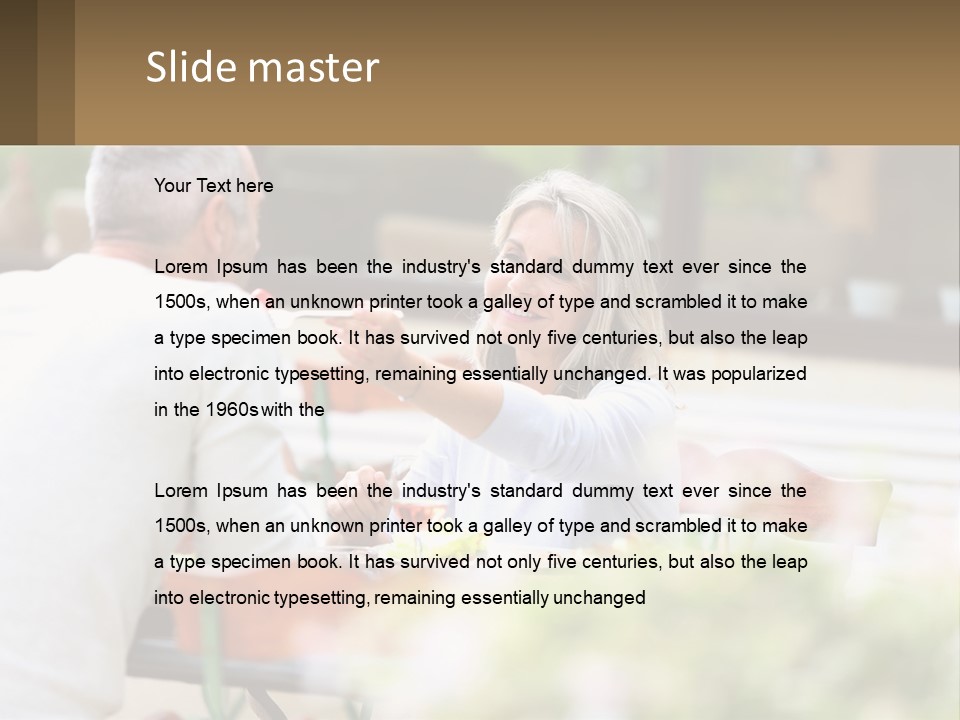 A Man And A Woman Sitting At A Table Eating Food PowerPoint Template