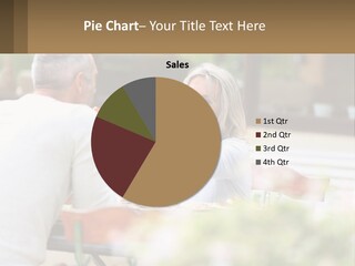 A Man And A Woman Sitting At A Table Eating Food PowerPoint Template