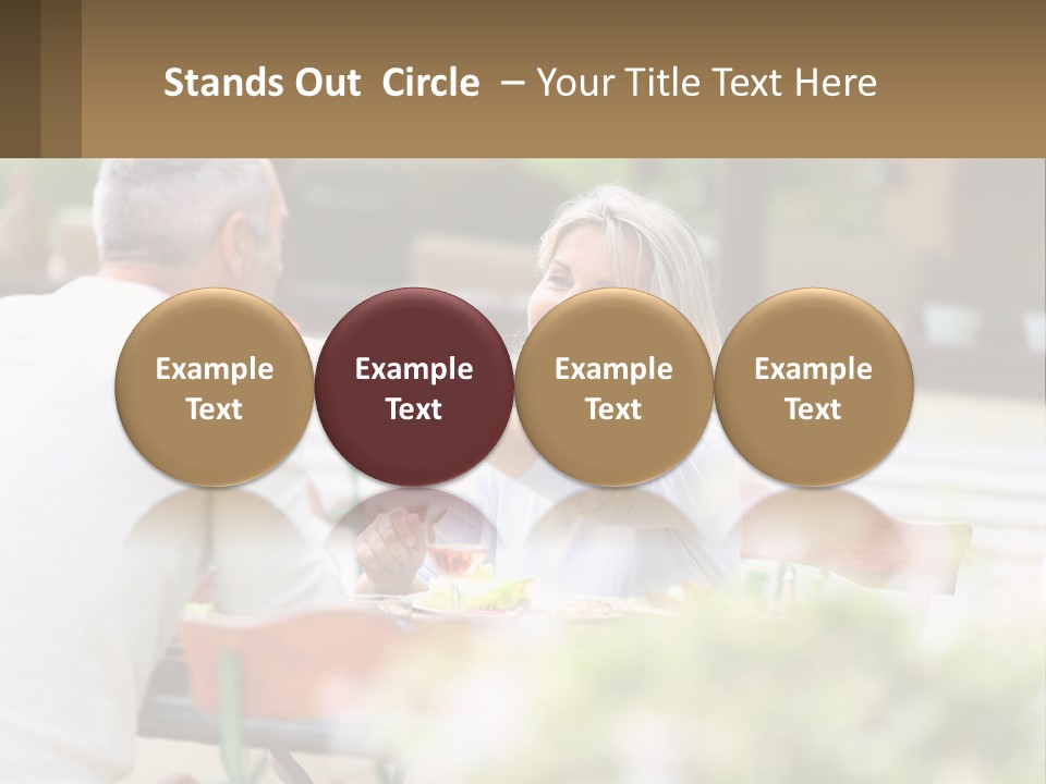 A Man And A Woman Sitting At A Table Eating Food PowerPoint Template