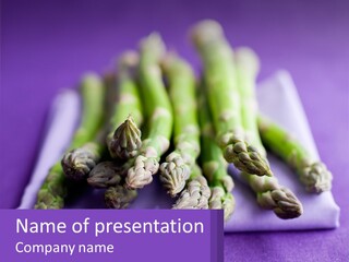 A Bunch Of Green Asparagus On A Purple Surface PowerPoint Template