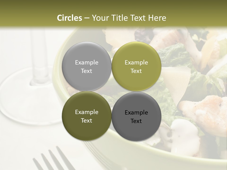 A Green Bowl Filled With Salad Next To A Glass Of Wine PowerPoint Template