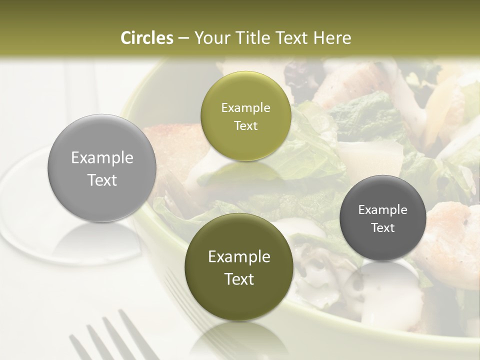 A Green Bowl Filled With Salad Next To A Glass Of Wine PowerPoint Template