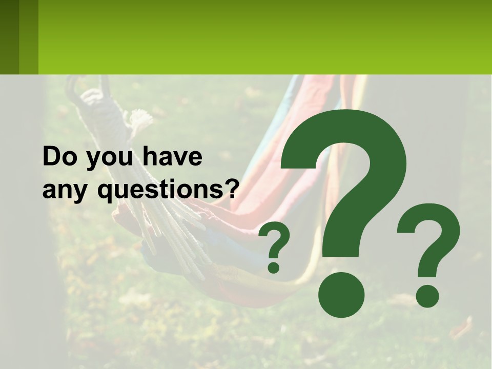 A Colorful Hammock Hanging From A Tree In A Park PowerPoint Template