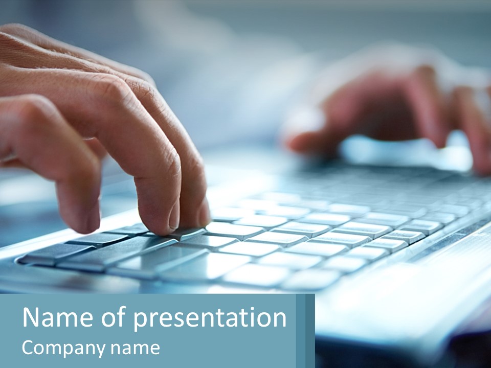 A Person Typing On A Laptop With Their Hands PowerPoint Template