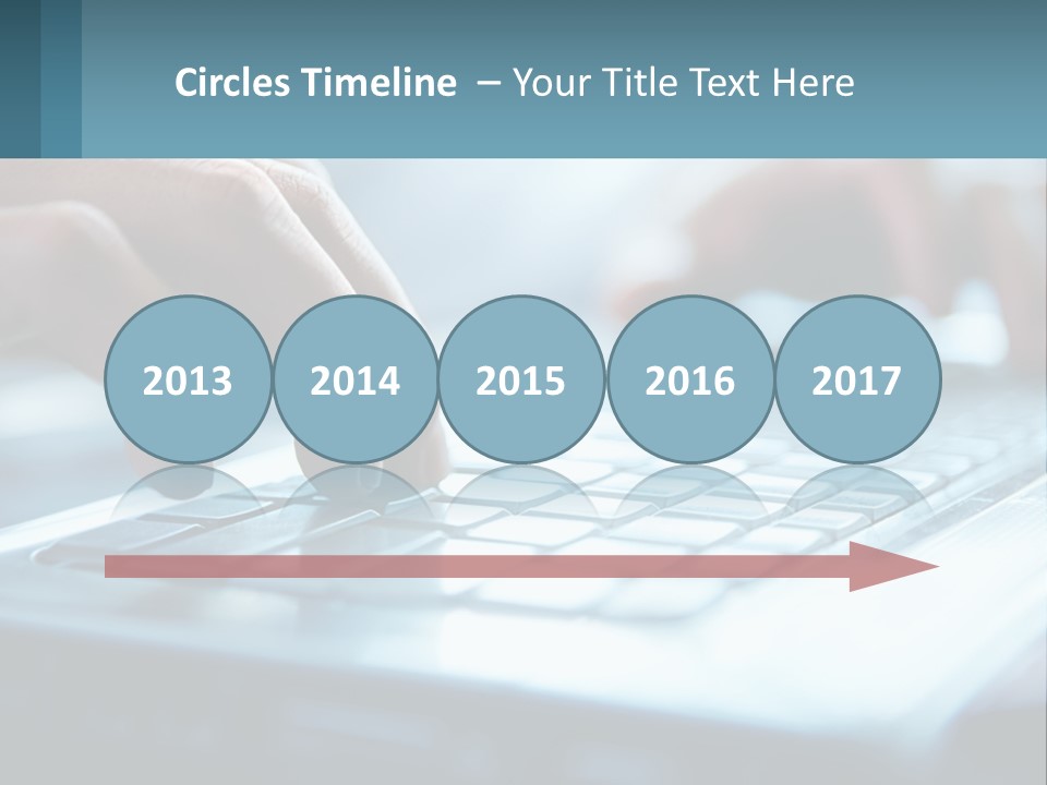 A Person Typing On A Laptop With Their Hands PowerPoint Template