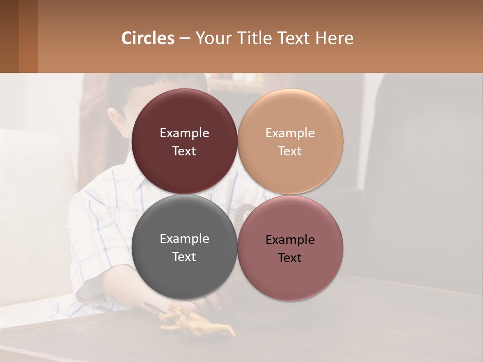 A Young Boy Sitting At A Table With A Toy PowerPoint Template