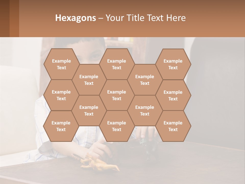 A Young Boy Sitting At A Table With A Toy PowerPoint Template