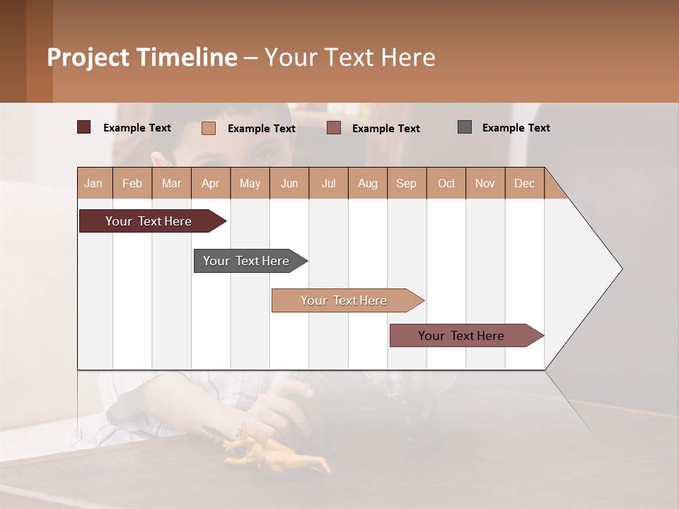 A Young Boy Sitting At A Table With A Toy PowerPoint Template