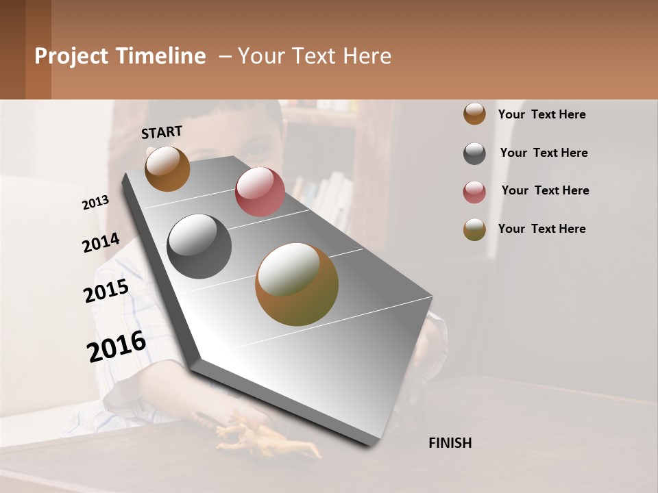 A Young Boy Sitting At A Table With A Toy PowerPoint Template