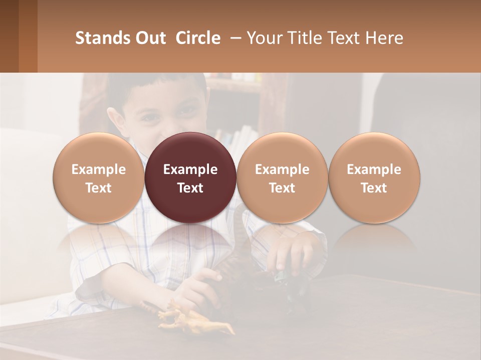 A Young Boy Sitting At A Table With A Toy PowerPoint Template