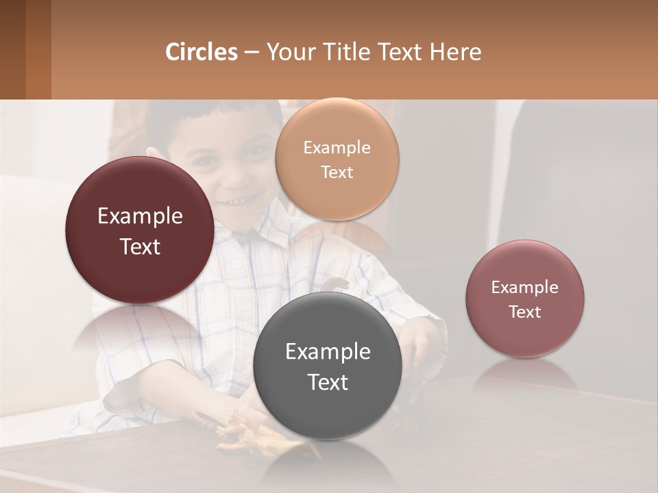 A Young Boy Sitting At A Table With A Toy PowerPoint Template