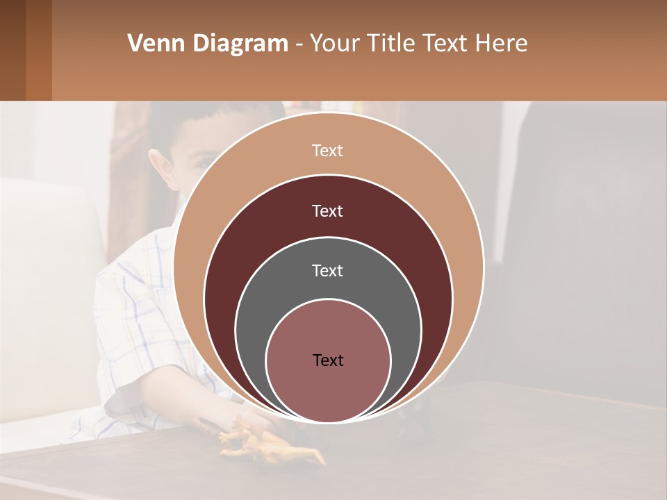 A Young Boy Sitting At A Table With A Toy PowerPoint Template