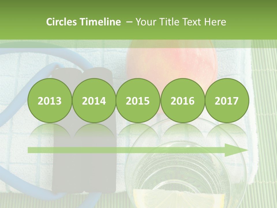 A Glass Of Water, Lemon, And A Piece Of Fruit On A Mat PowerPoint Template