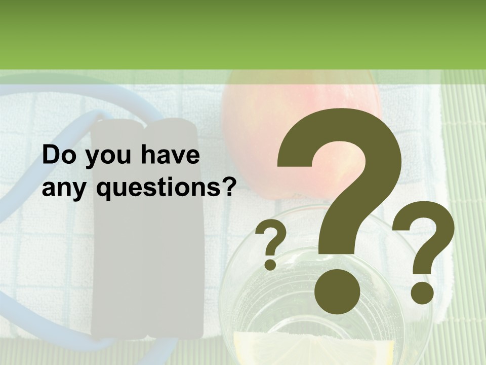 A Glass Of Water, Lemon, And A Piece Of Fruit On A Mat PowerPoint Template
