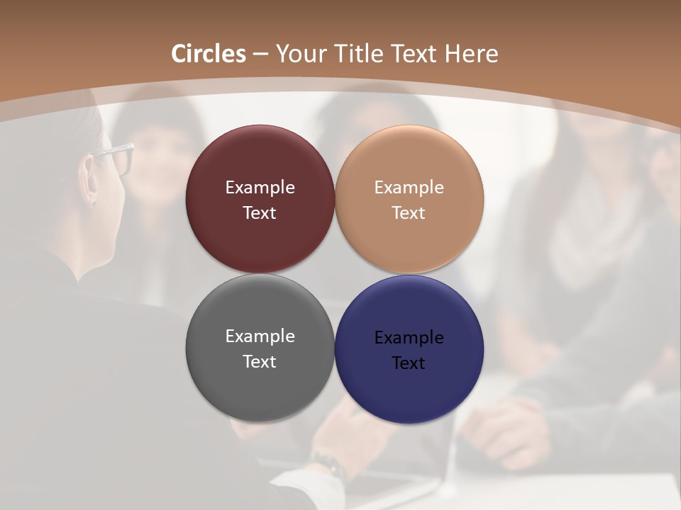 A Group Of People Sitting At A Table With A Laptop PowerPoint Template