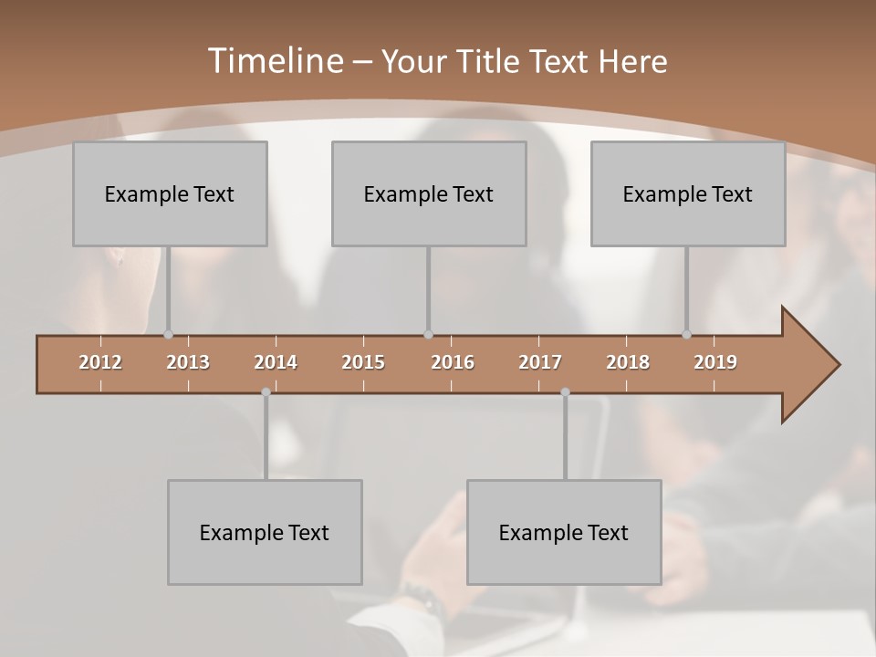 A Group Of People Sitting At A Table With A Laptop PowerPoint Template