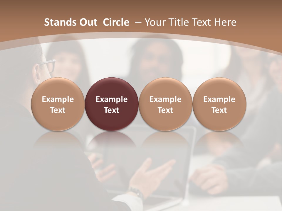 A Group Of People Sitting At A Table With A Laptop PowerPoint Template