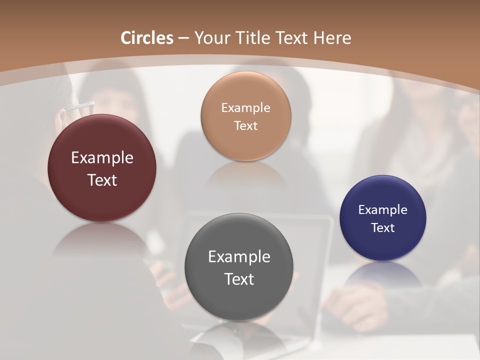 A Group Of People Sitting At A Table With A Laptop PowerPoint Template