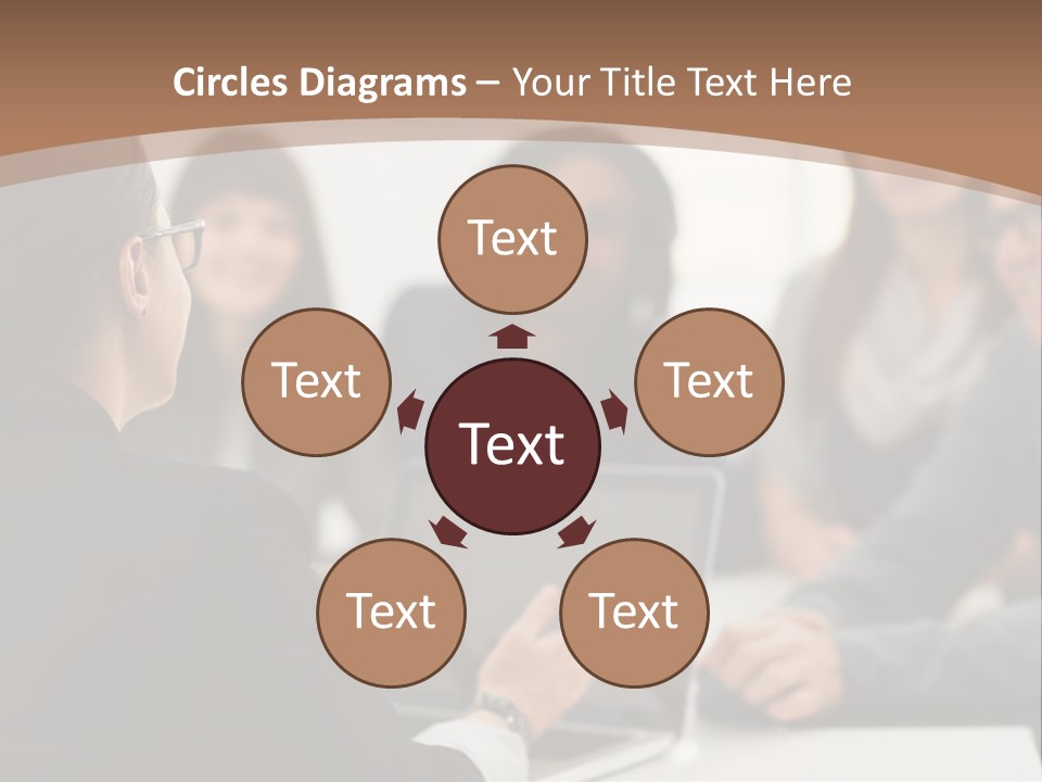 A Group Of People Sitting At A Table With A Laptop PowerPoint Template