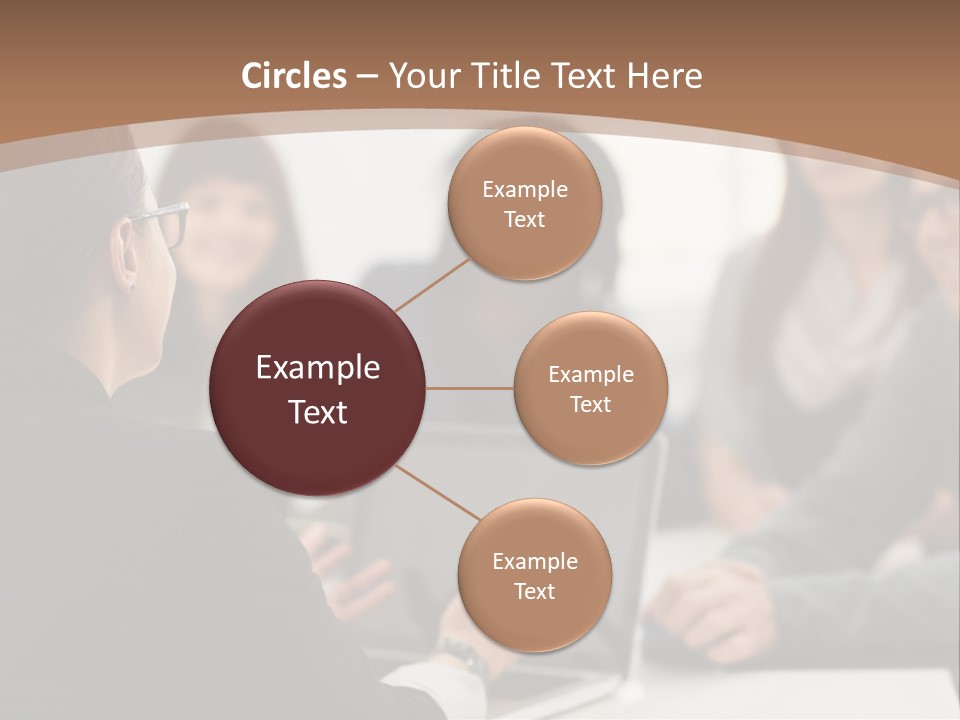 A Group Of People Sitting At A Table With A Laptop PowerPoint Template