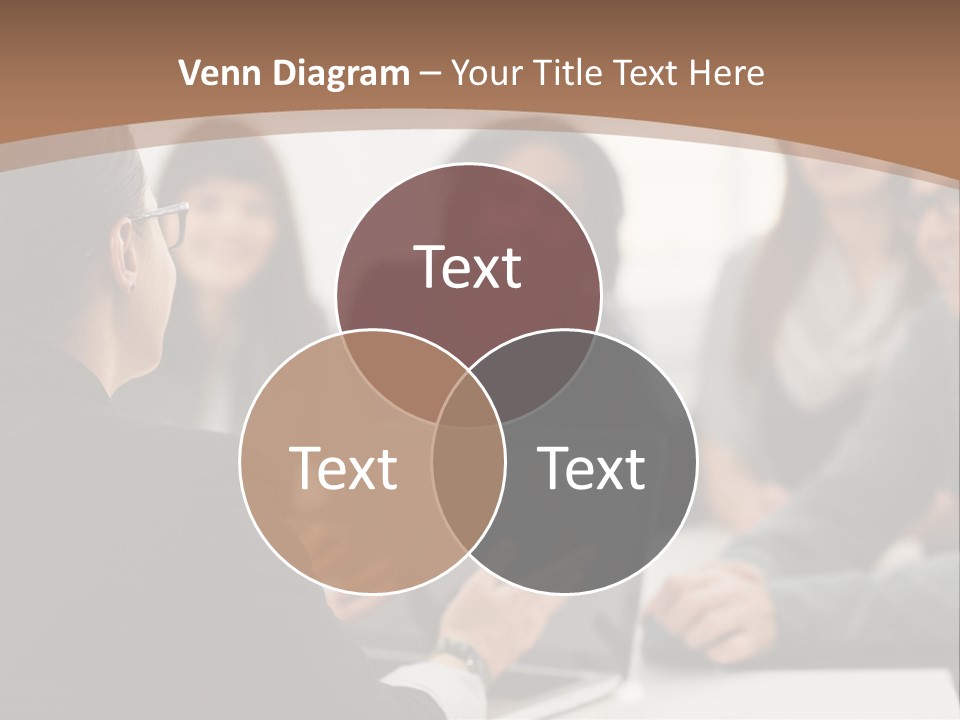 A Group Of People Sitting At A Table With A Laptop PowerPoint Template