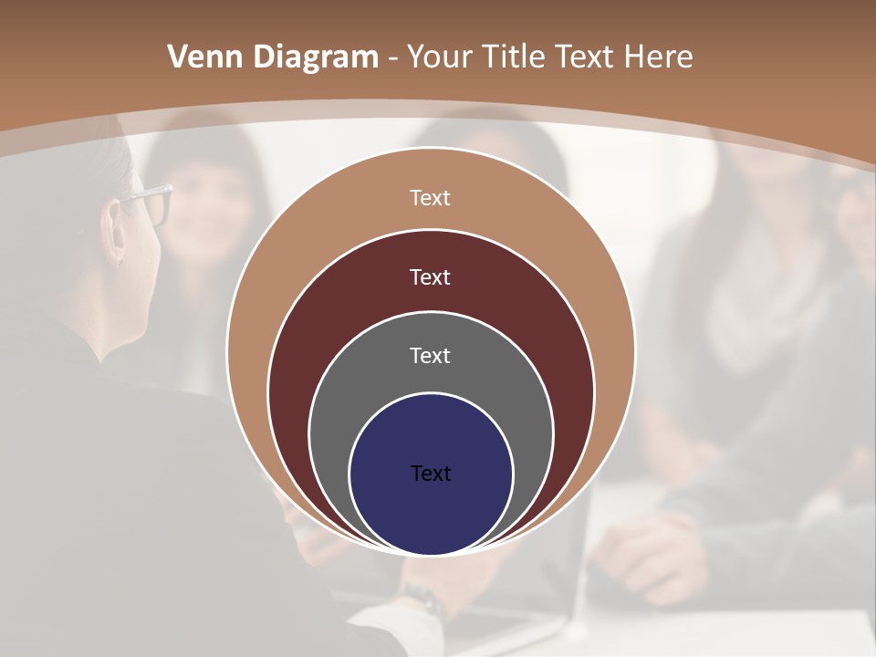 A Group Of People Sitting At A Table With A Laptop PowerPoint Template