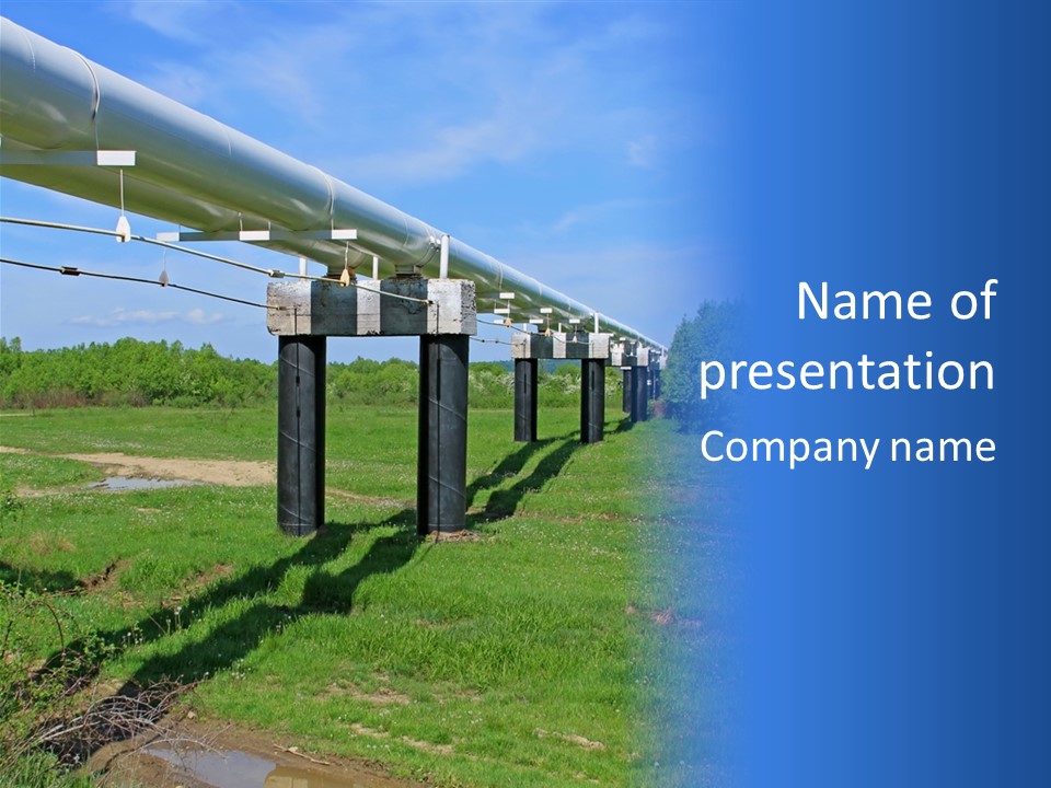 A Row Of Power Lines In A Green Field PowerPoint Template