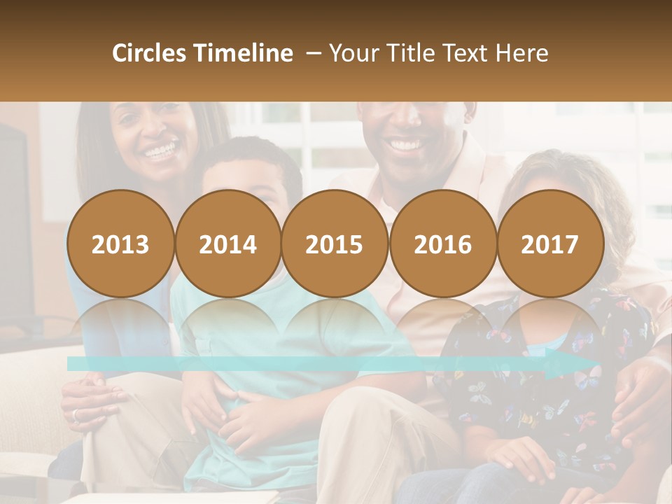 A Family Sitting On A Couch In A Living Room PowerPoint Template
