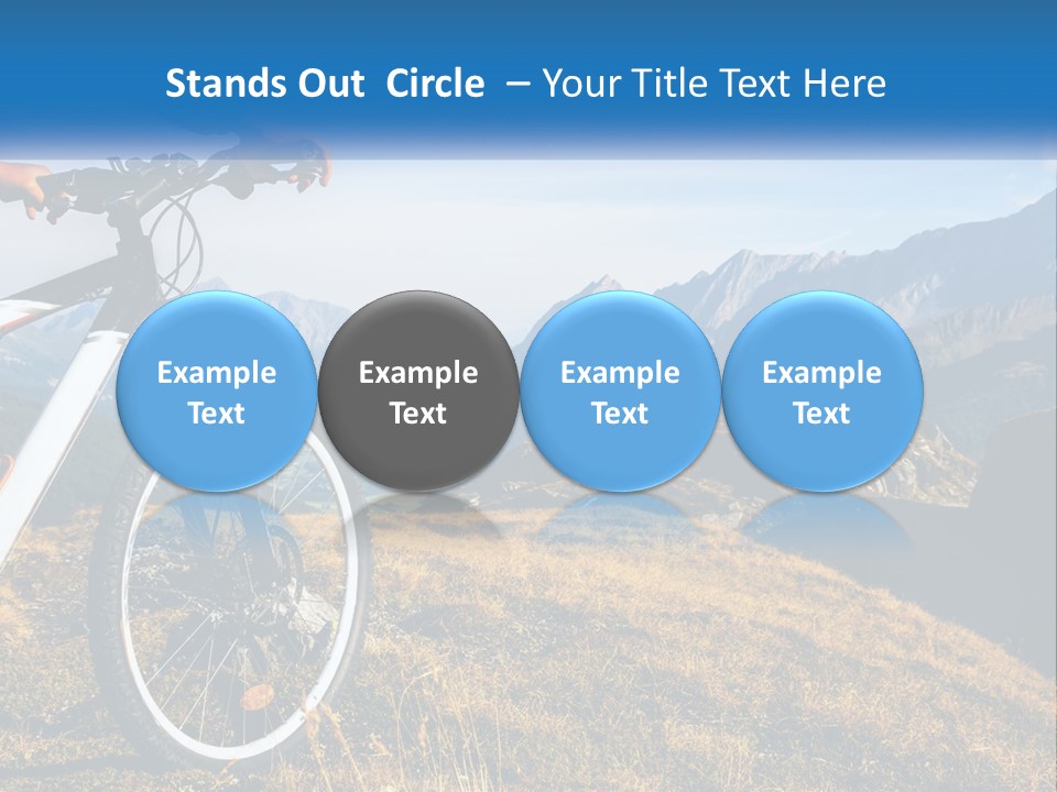 A Person Riding A Bike In The Mountains PowerPoint Template