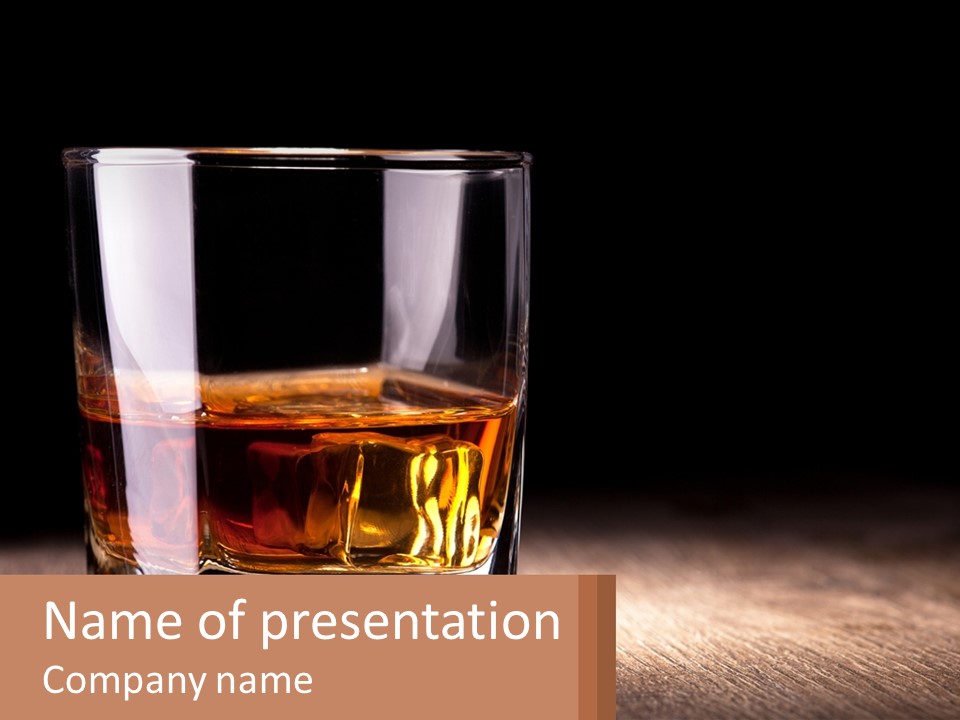 A Glass Of Whiskey On A Wooden Table PowerPoint Template