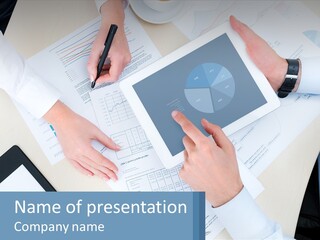 A Group Of People Sitting At A Table With A Tablet PowerPoint Template