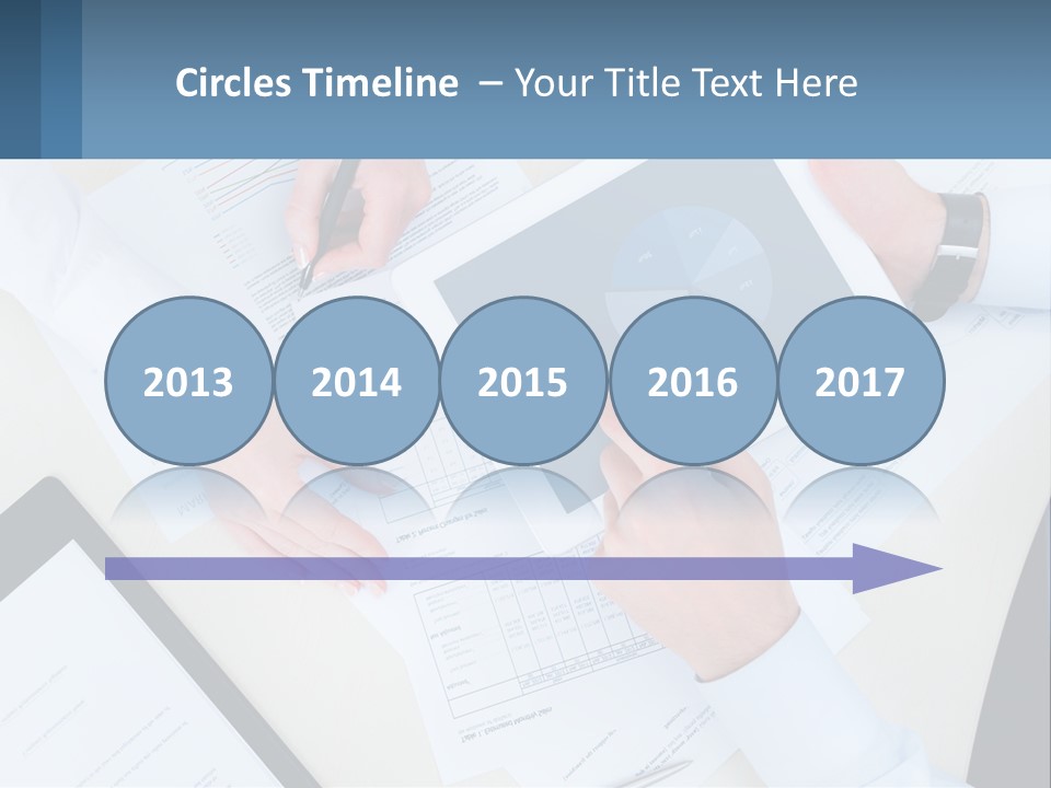 A Group Of People Sitting At A Table With A Tablet PowerPoint Template