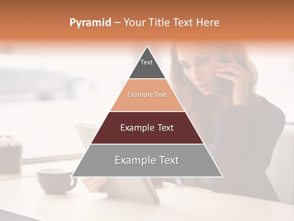 A Woman Sitting At A Table Talking On A Cell Phone PowerPoint Template