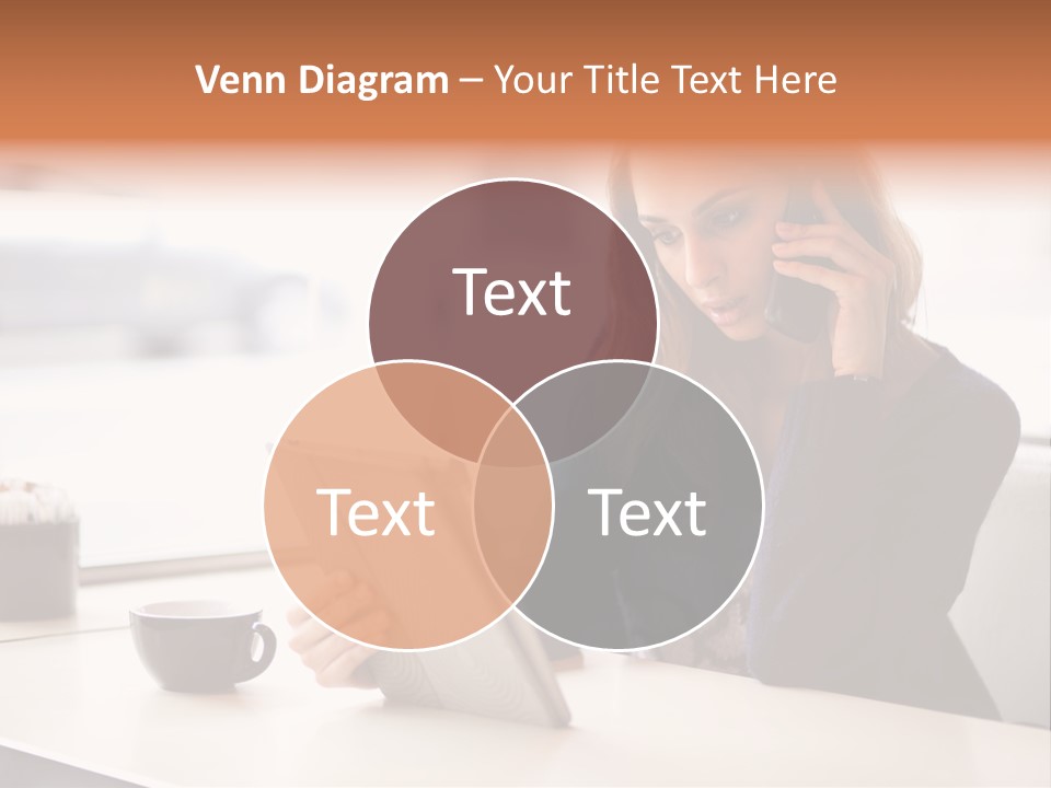 A Woman Sitting At A Table Talking On A Cell Phone PowerPoint Template