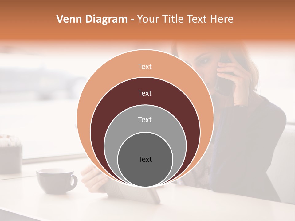 A Woman Sitting At A Table Talking On A Cell Phone PowerPoint Template