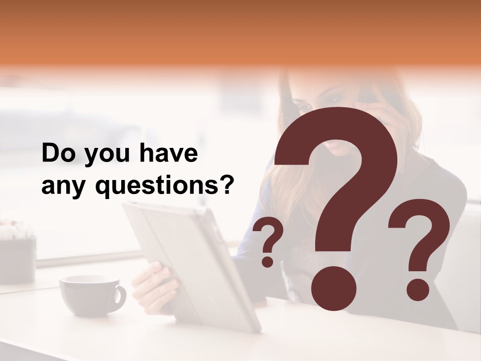 A Woman Sitting At A Table Talking On A Cell Phone PowerPoint Template