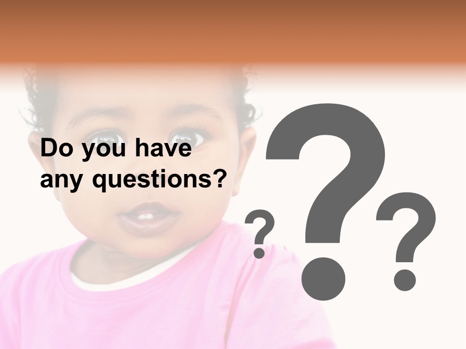 A Baby Girl In A Pink Shirt Is Looking At The Camera PowerPoint Template