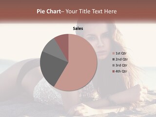 A Woman In A Bikini Laying On The Beach PowerPoint Template