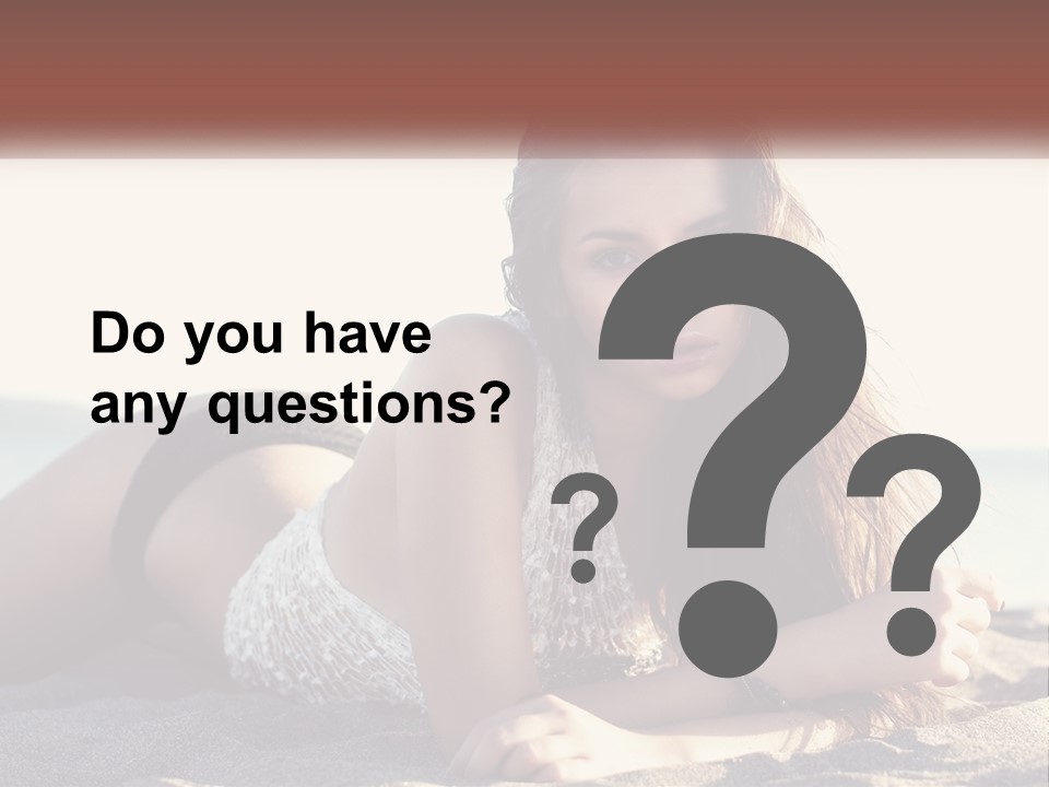 A Woman In A Bikini Laying On The Beach PowerPoint Template