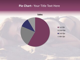 A Woman In A Bikini Laying On The Beach PowerPoint Template