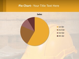 A Yellow Hard Hat Sitting On Top Of A Wooden Table PowerPoint Template