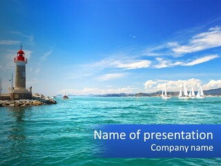 A Lighthouse With Sailboats In The Water On A Sunny Day PowerPoint Template