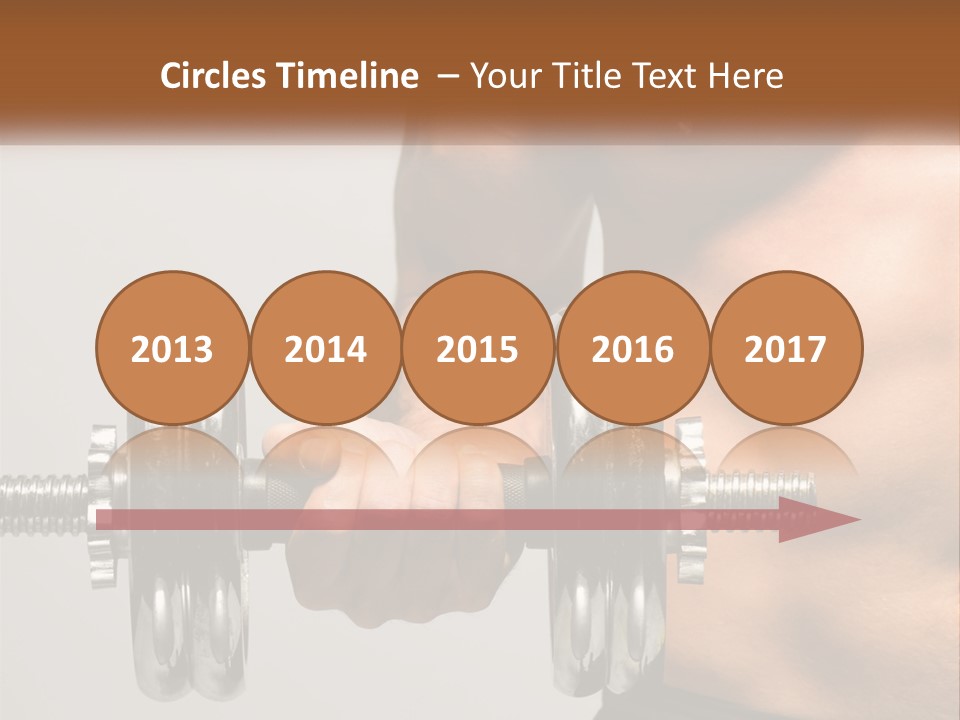 A Man Holding A Dumbbell In His Right Hand PowerPoint Template