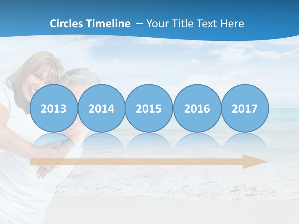 A Man And Woman Are Hugging On The Beach PowerPoint Template