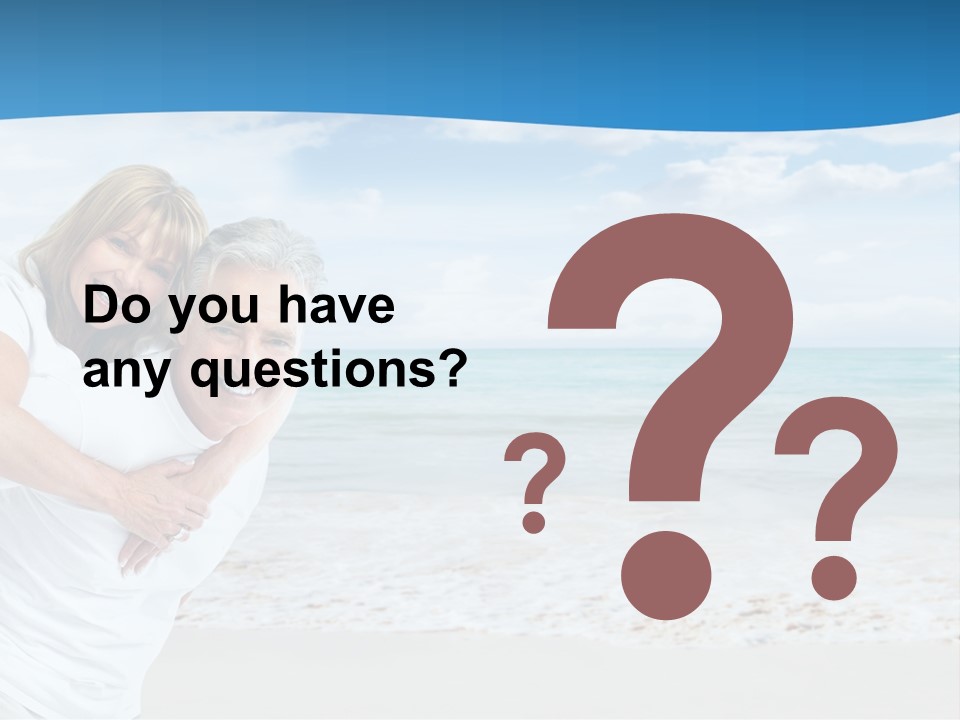 A Man And Woman Are Hugging On The Beach PowerPoint Template