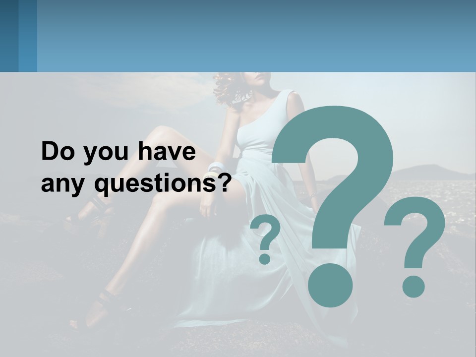 A Woman In A Blue Dress Is Sitting On A Rock PowerPoint Template