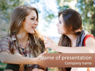 Two Young Women Talking To Each Other In A Park PowerPoint Template