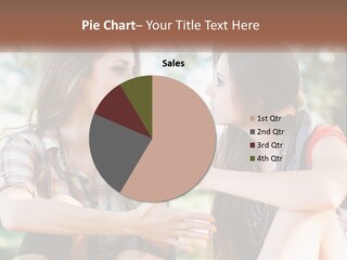 Two Young Women Talking To Each Other In A Park PowerPoint Template