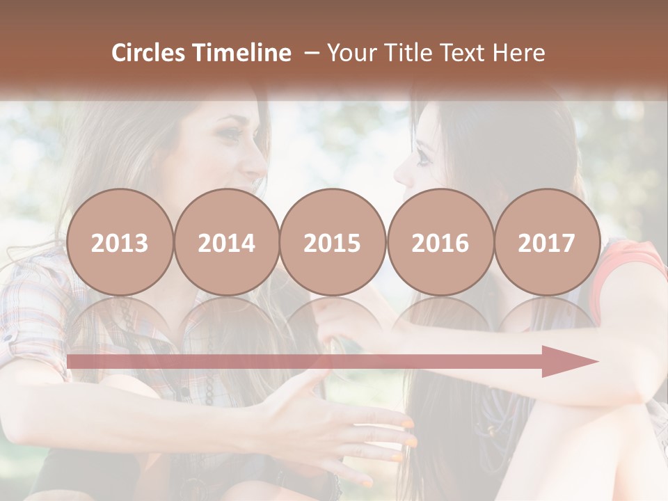 Two Young Women Talking To Each Other In A Park PowerPoint Template